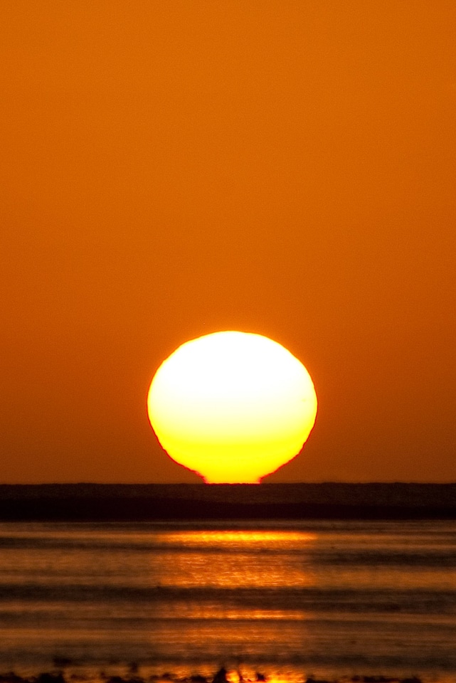 Hot Sunset Over Water