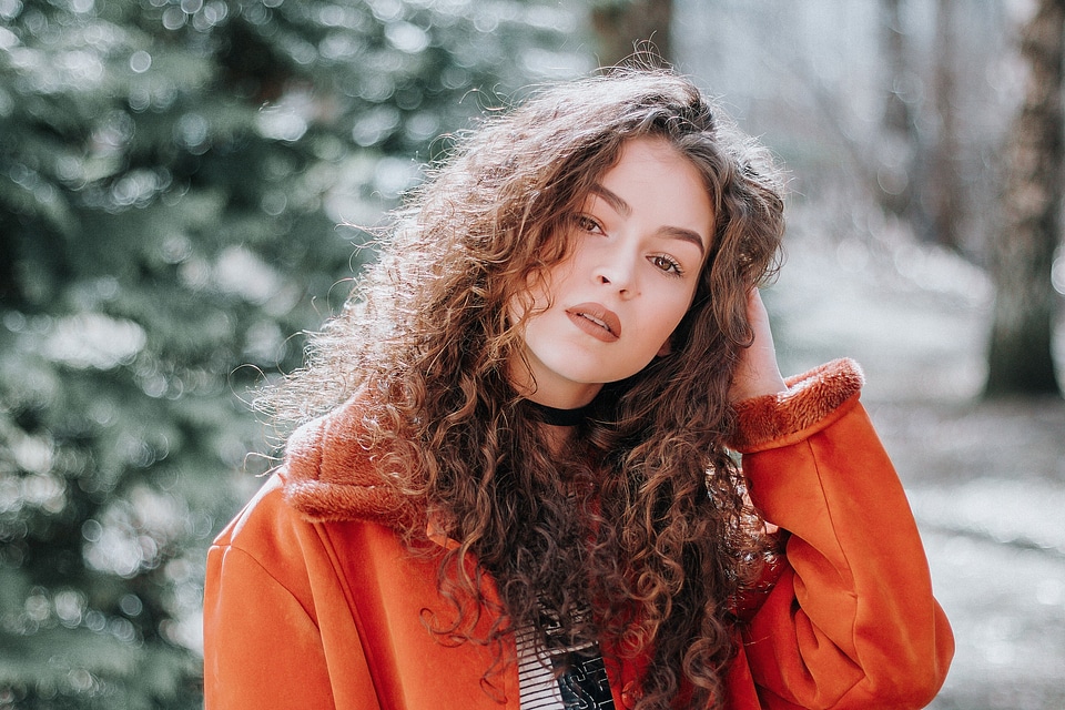 Woman In Orange Zip Up Jacket
