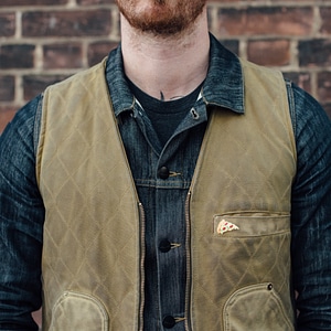 Man Wearing Pizza Lapel Pin