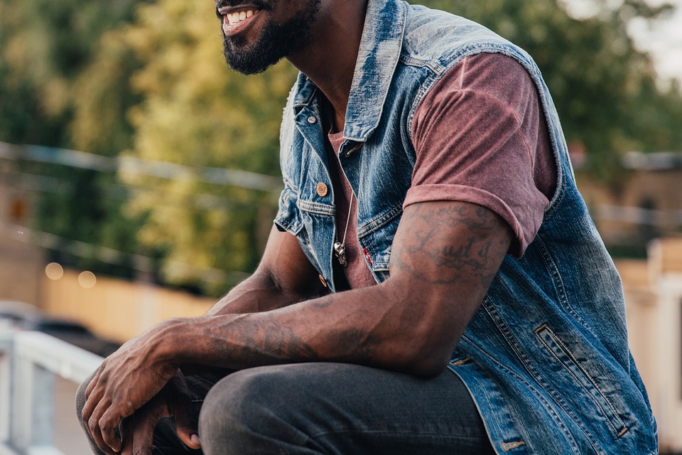 Man Relaxes And Smiles