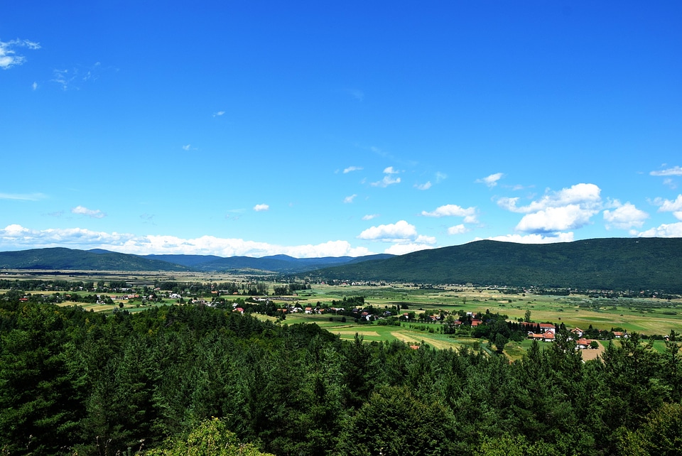 Farmland And Green Hillside Landscape