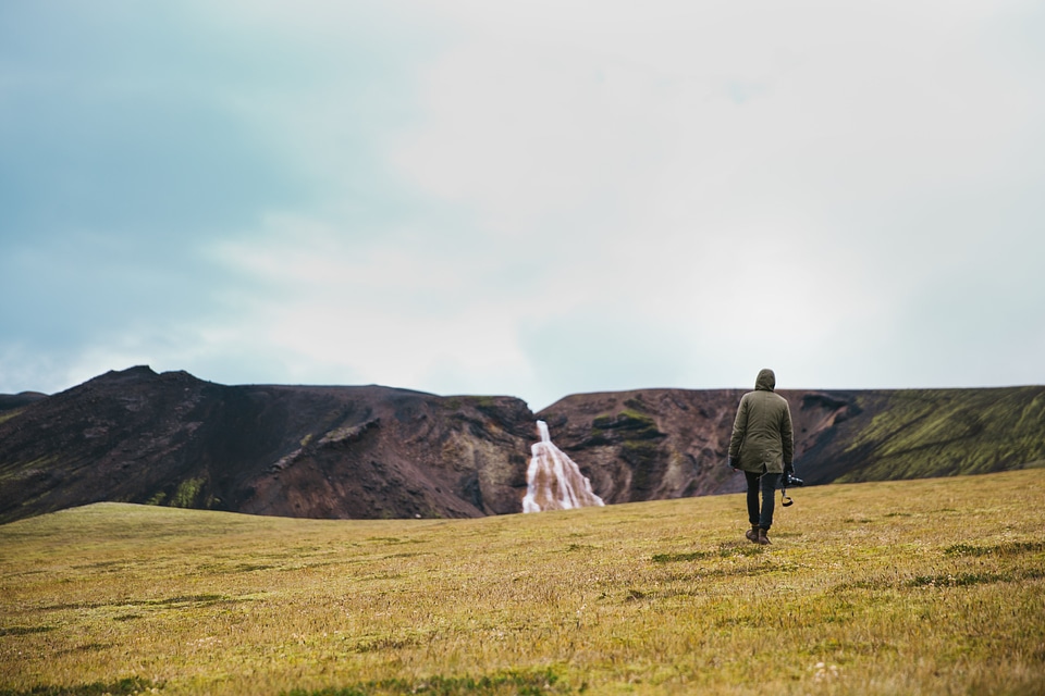 Hiking Green Field Near Glacier photo