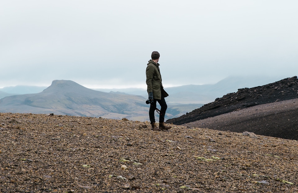 Hiker In Rocky Iceland Field photo