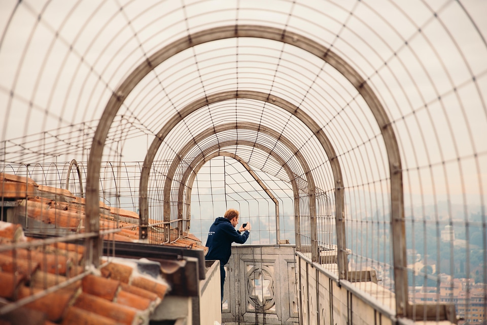 Tourist In Rooftop Walkway