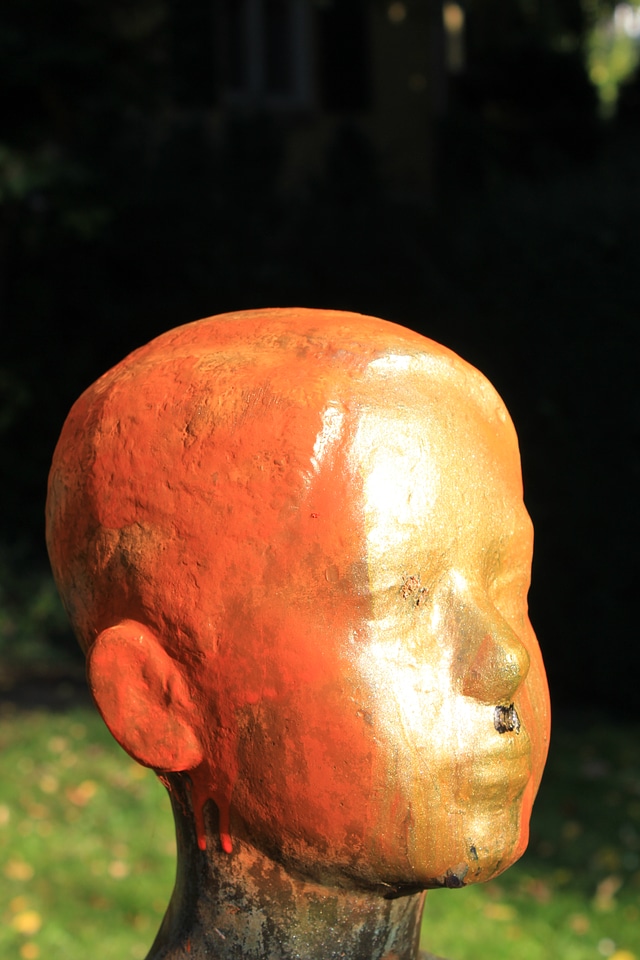 Sprayed and defaced bronze sculpture