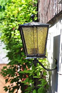 Old lantern with yellow glass