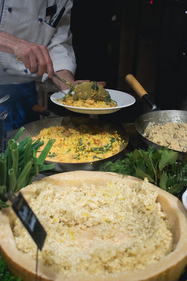 Cook scoops risotto