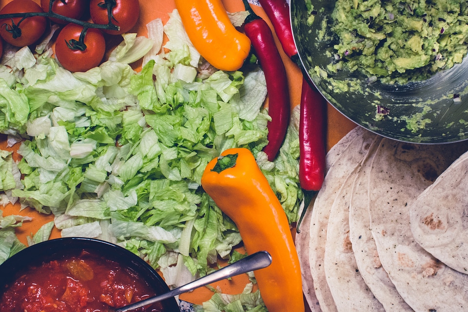 Preparing Mexican burritos