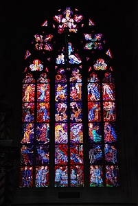 Huge stained-glass window in St. Vitus cathedral photo