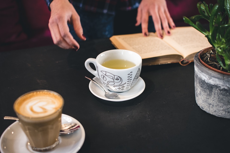 A cup of tea with a book