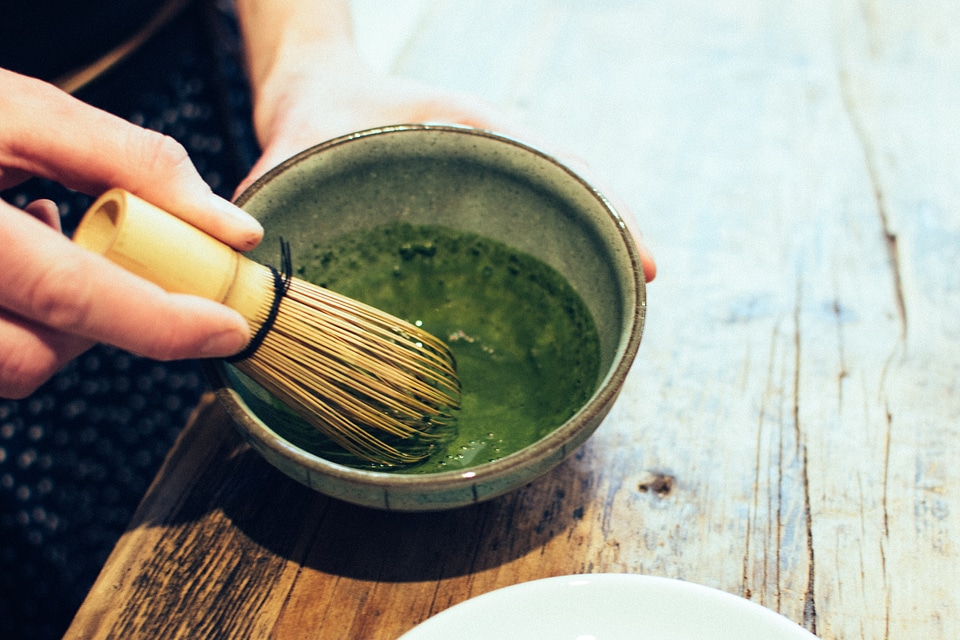 Matcha tea whisking photo