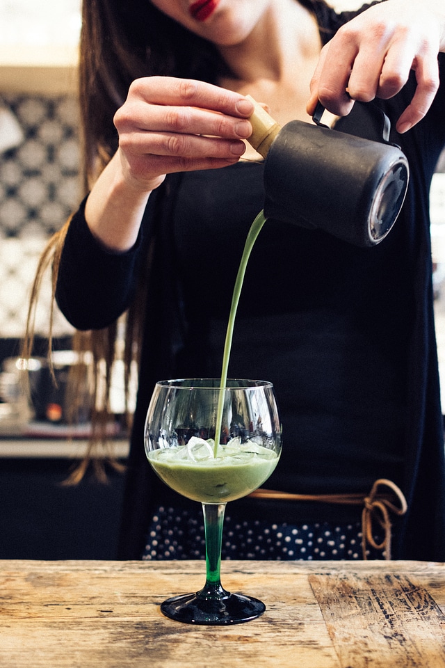 Preparing Matcha cocktail