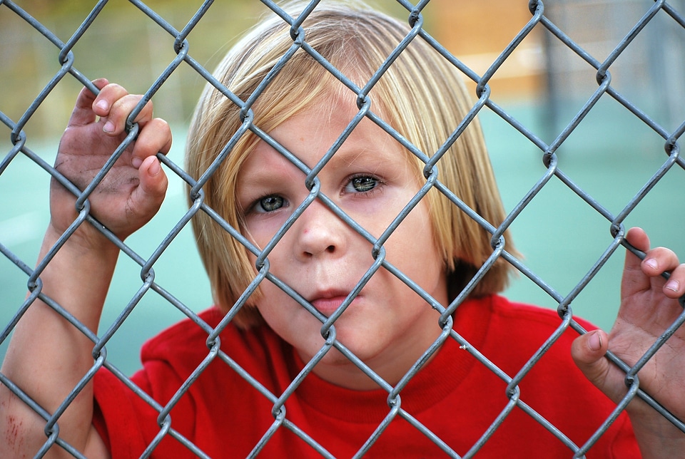 Chain link young child photo