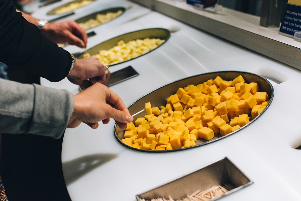 Tasting cheese in a cheese factory