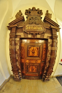 Heavy wooden door inside Prague’s old townhall photo