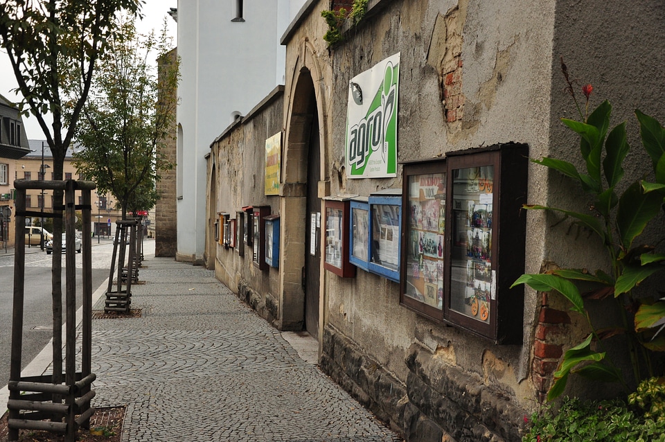 Lots of showcases on an old wall in Turnov