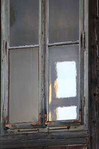 Light shines through old window