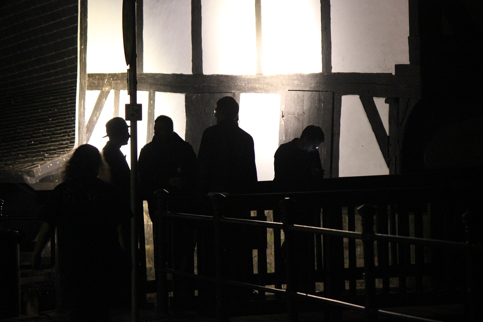Group of people among the shades
