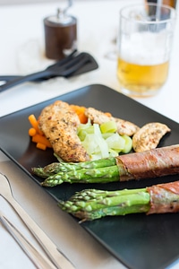 Chicken steak with vegetables and beer photo