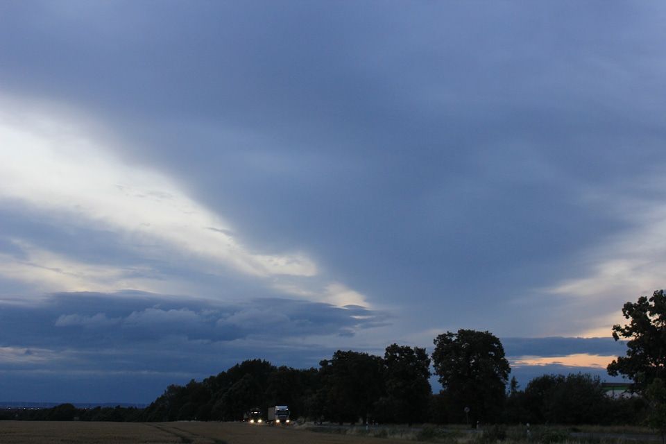 Trucks on lonely road at blue hour