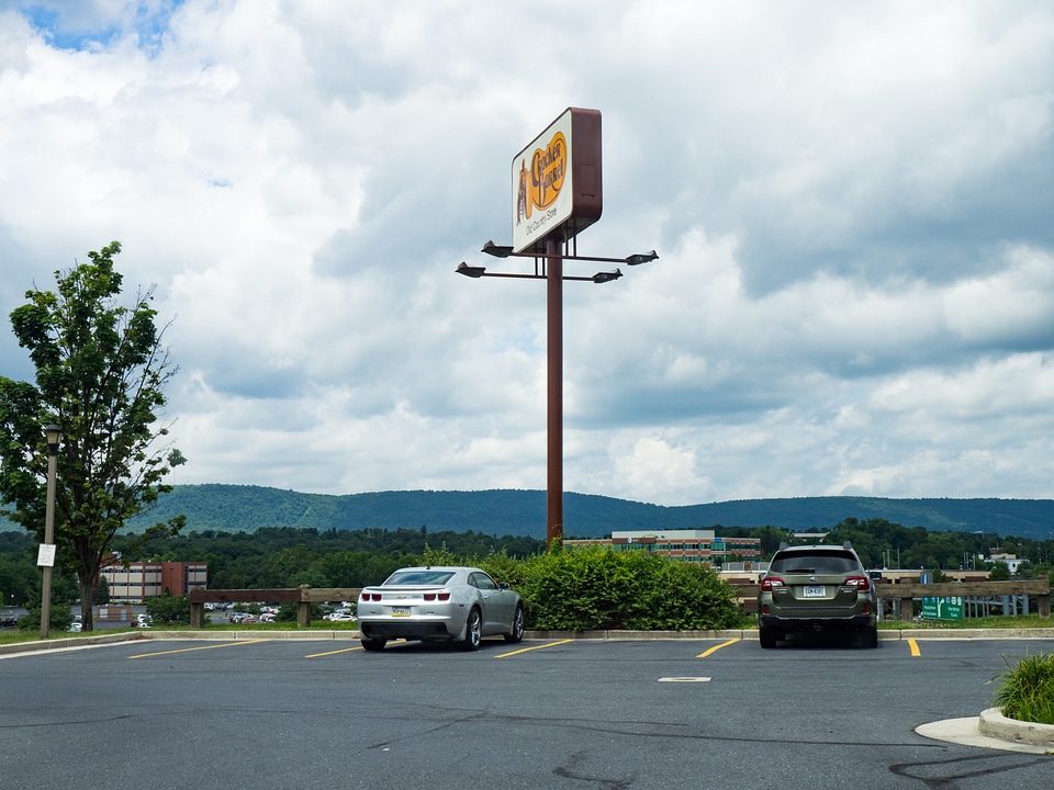 Parking Lot Overlooking Highway and Mountains photo