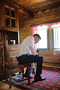 Cabin man sitting photo