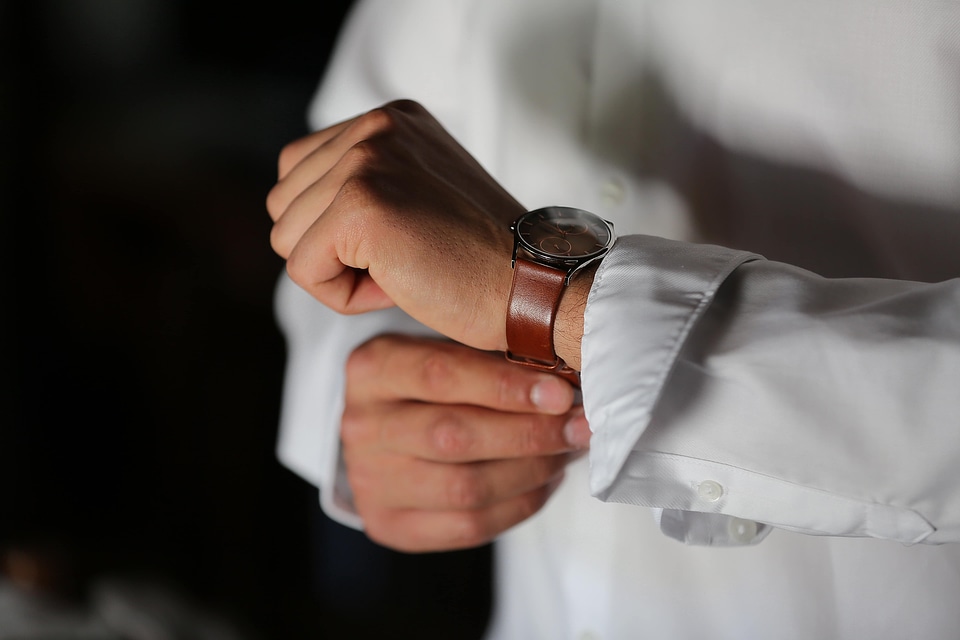 Hands fist wristwatch