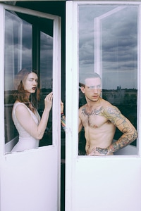 Couple Standing by the Window photo