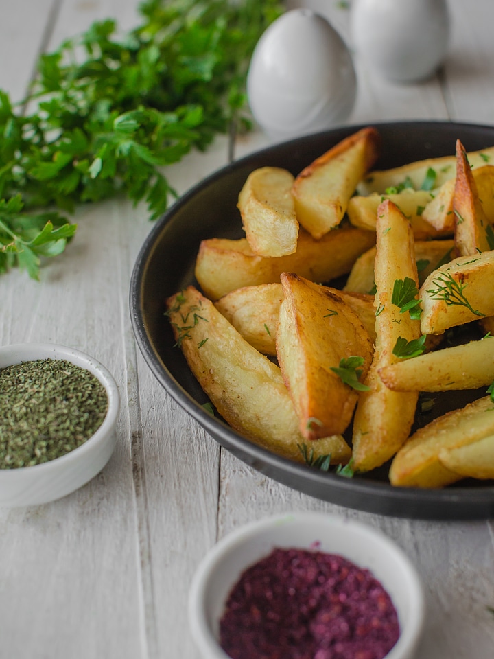 Roasted potatoes with seasoning photo