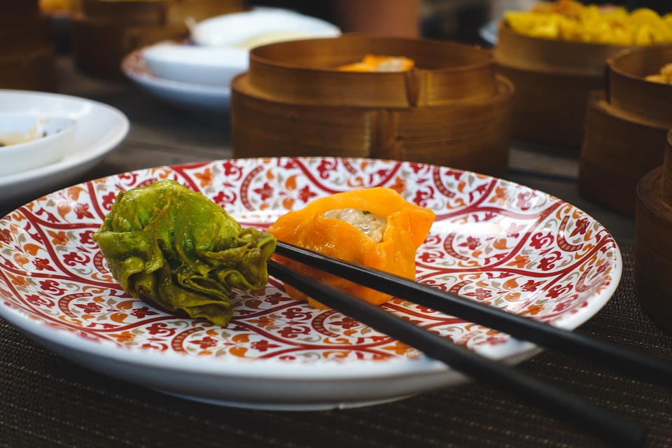 Chinese fried dim sum with chopsticks photo