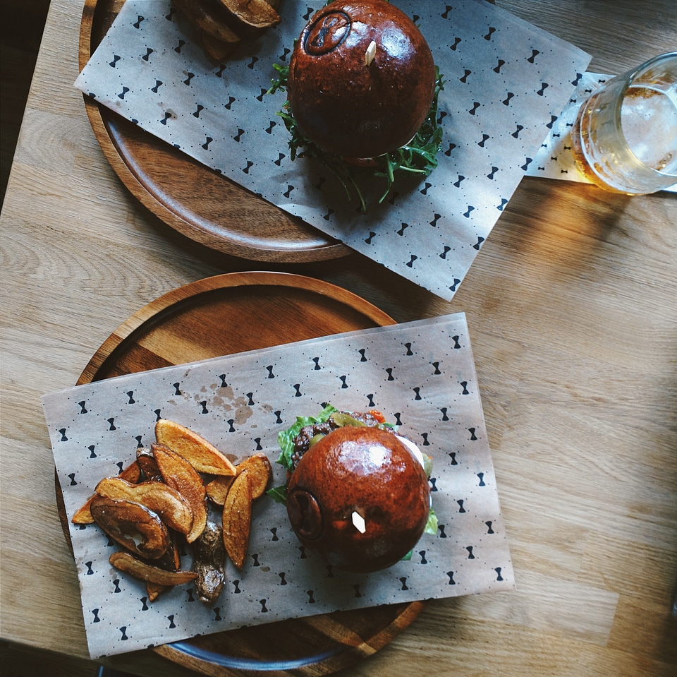 Beef burgers with homemade baked potatoes from above