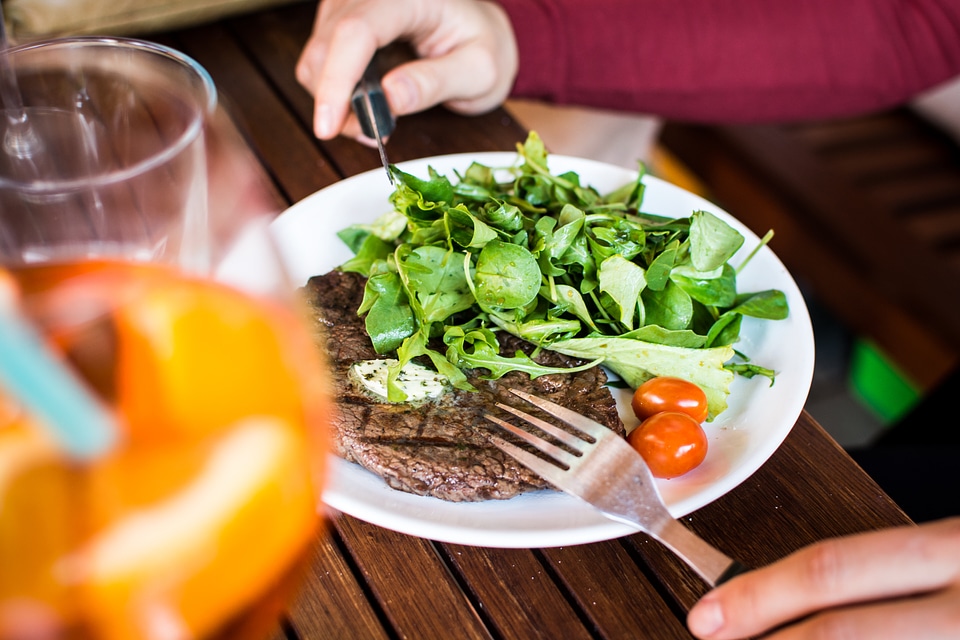 Barbequed beef steak with greens
