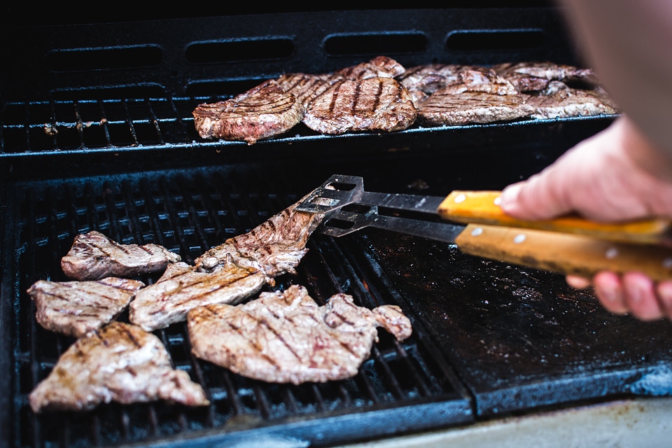 Barbequed beef steak with greens