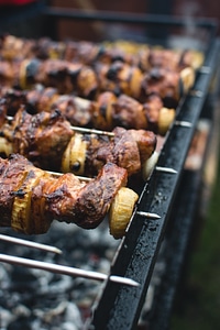 Grilling meat skewers photo