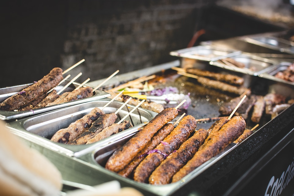 Grilling meat skewers photo