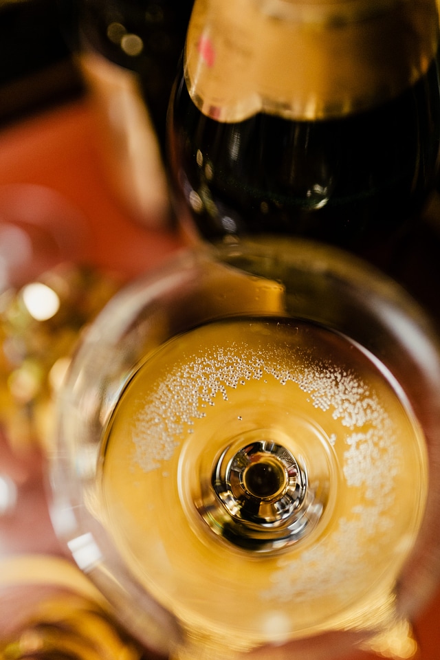 Detail of New Year’s Eve glass of champagne