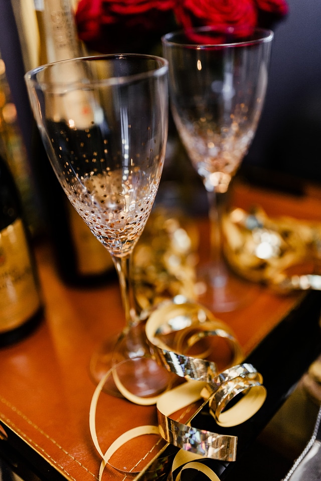 Empty champagne glasses on New Year’s Eve