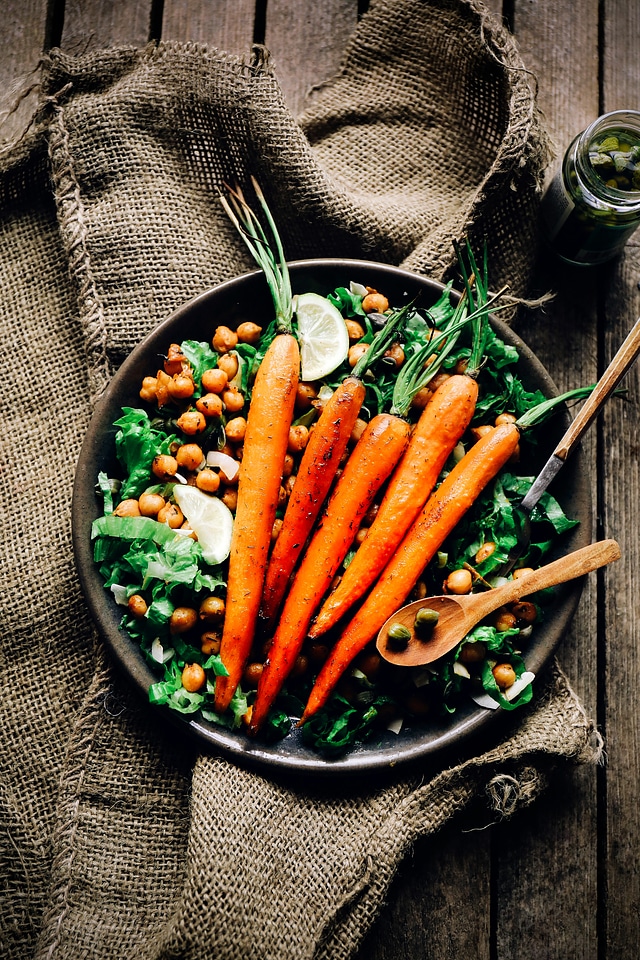 Baked carrots on a chickpeas salad