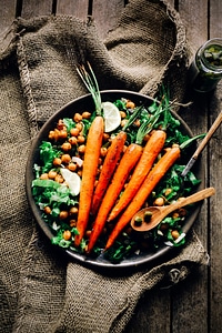 Baked carrots on a chickpeas salad