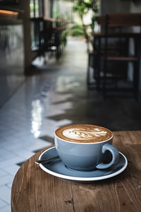 Cappuccino in a cozy coffeeshop photo