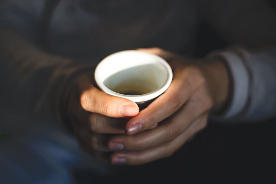 Female Hands Holding Espresso