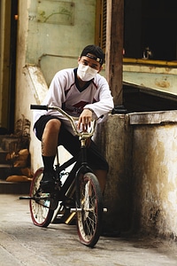 Asian Guy on the Bike photo