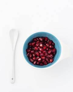 Pomegranate seeds in a bowl photo