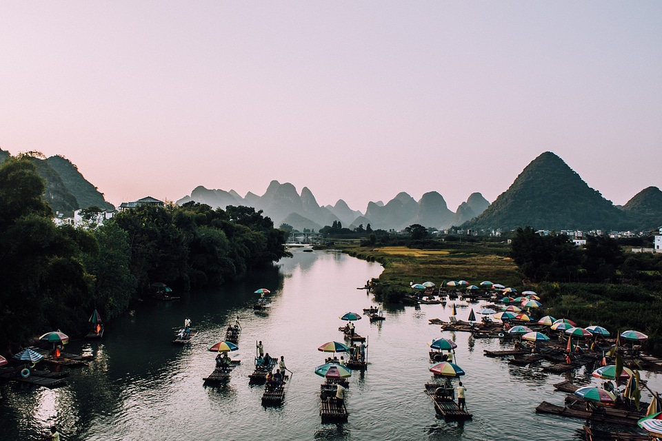 Bamboo Boats with Umbrellas Rafting the Yulong River photo