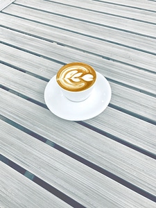 Morning espresso with flower latté art