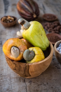 Raw cashew nuts fruit close up photo