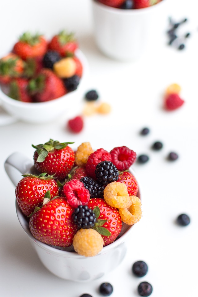 Colorful healthy fresh berries in a cup
