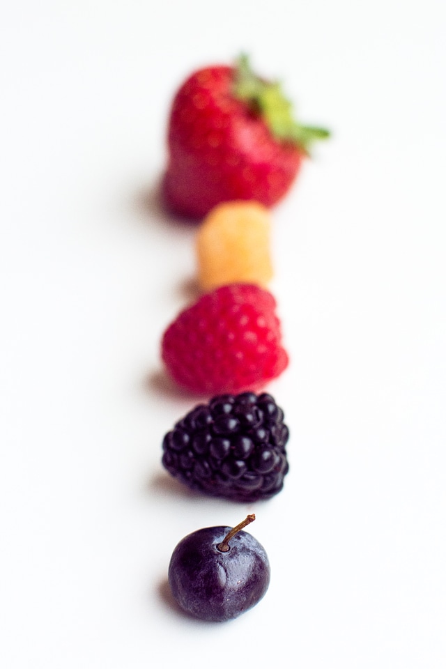 Fresh raspberries with other red fruit and vegetables