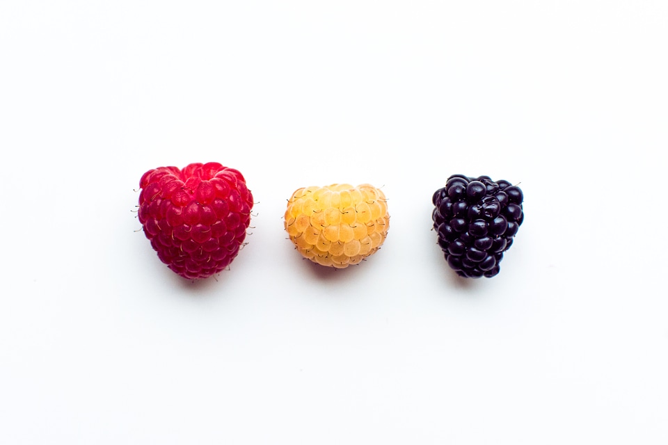 Colorful fresh berries on a white background