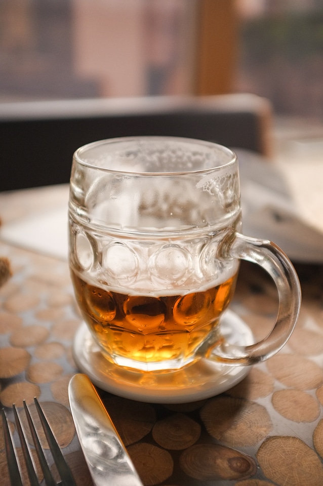 Half-full glass of beer